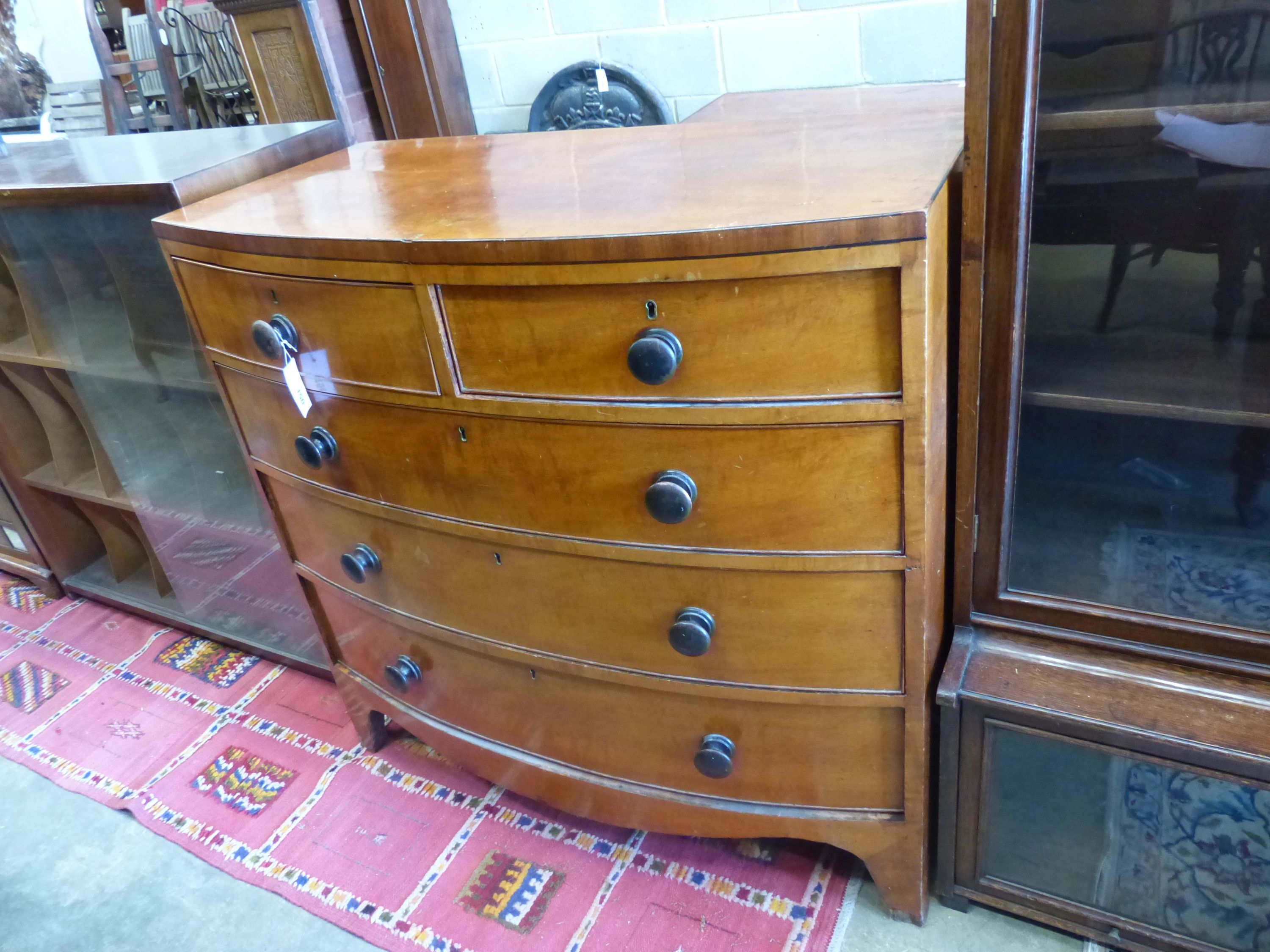 An early Victorian mahogany bowfront chest, width 104cm, depth 51cm, height 101cm